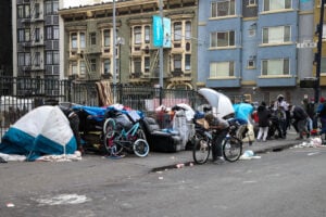 SAN FRANCISCO, CA - OCTOBER 30: Homeless people are seen on streets of the Tenderloin district in San Francisco, California, United States on October 30, 2021. Last week on Tuesday, San Francisco housing project for homeless development is rejected by a majority of the city supervisors with an 8 to 3 vote. (Photo by Tayfun Coskun/Anadolu Agency via Getty Images)