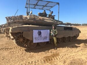 Shraga Stern with Brothers for Life flag