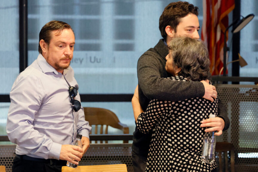 Aura Ines Nino de Henao is hugged by her son, Felipe Henao, as she leaves a news conference with Felipe and her son, Diego Henao, left, in Fort Lauderdale, Florida, on Wednesday, May 8, 2024. Her daughter, Ana Henao Knezevich, was reported missing while in Spain in February. Her husband was arrested by the FBI at Miami International Airport this past weekend and charged with kidnapping in connection with her disappearance. (Amy Beth Bennett/South Florida Sun Sentinel/Tribune News Service via Getty Images)