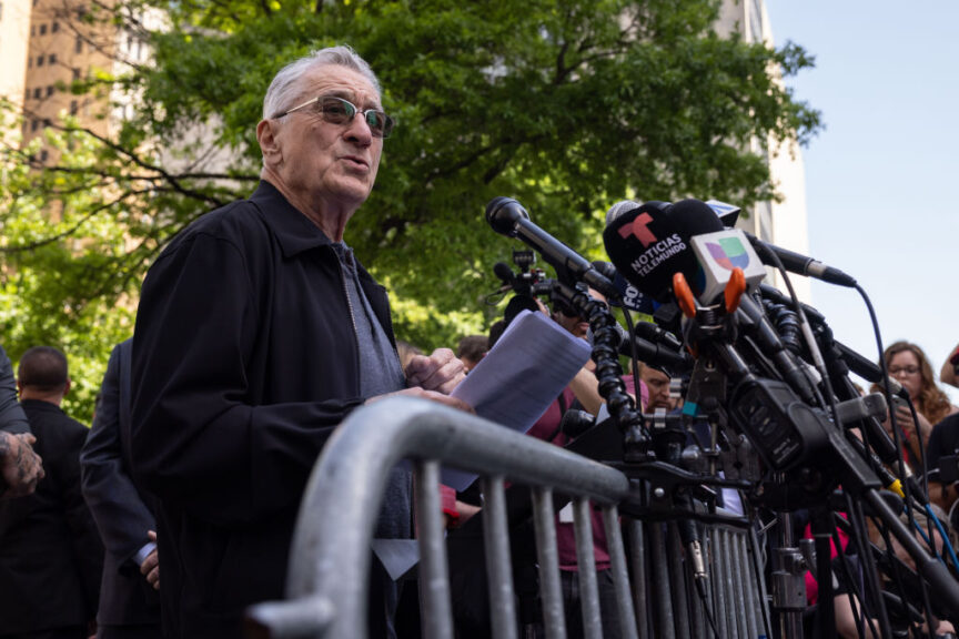 Actor Robert De Niro speaks during a news conference outside Manhattan criminal court in New York, US, on Tuesday, May 28, 2024. Former US President Donald Trump faces 34 felony counts of falsifying business records as part of an alleged scheme to silence claims of extramarital sexual encounters during his 2016 presidential campaign. Photographer: Yuki Iwamura/Bloomberg via Getty Images