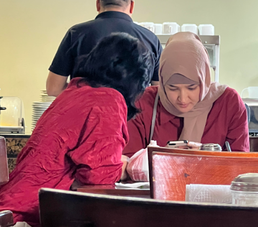 Kyrgyz women in a Matamoros, Mexico hotel waiting for DHS to approve their CBP One phone app applications for escorted entry into Brownsville, Texas. May 2023 photo by Todd Bensman