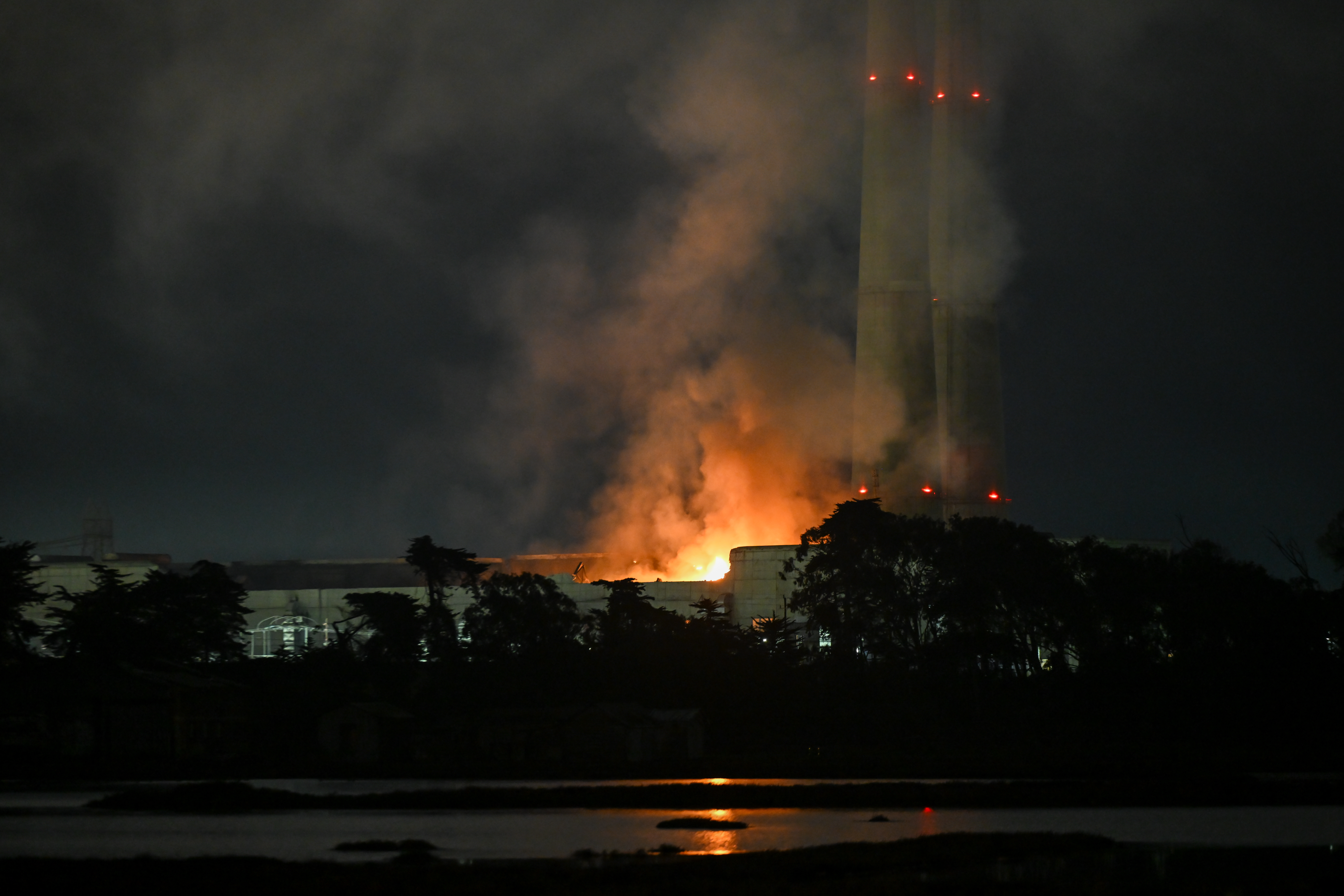 A view of flames and giant smoke over the sky as a fire erupted at Moss Landing Power Plant on Thursday that located on Pacific Coast Highway in Moss Landing of Monterey Bay, California, United States on January 17, 2025.