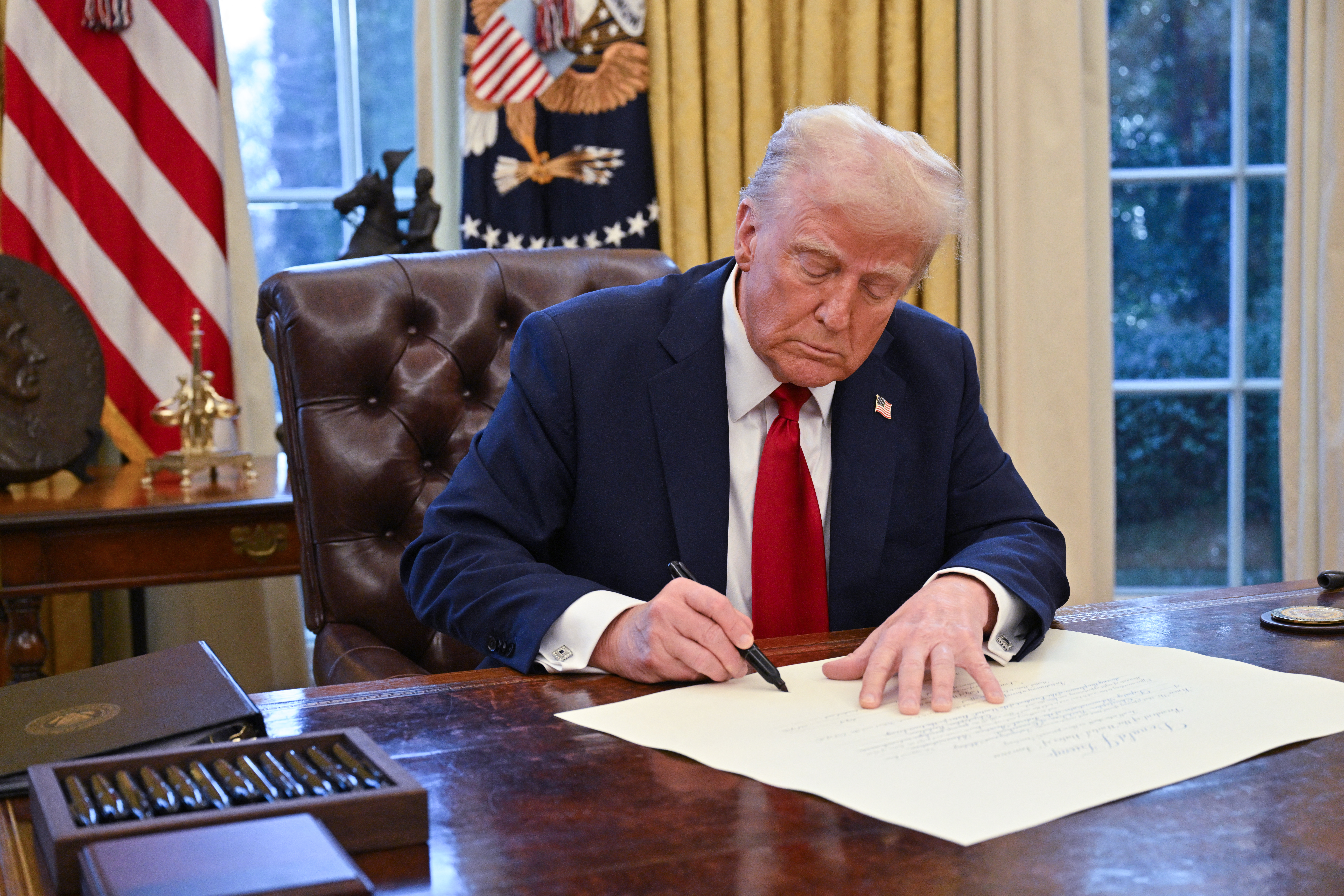 NextImg:Donald Trump Issues Executive Orders On Flight Safety, DEI Following Reagan Airport Tragedy