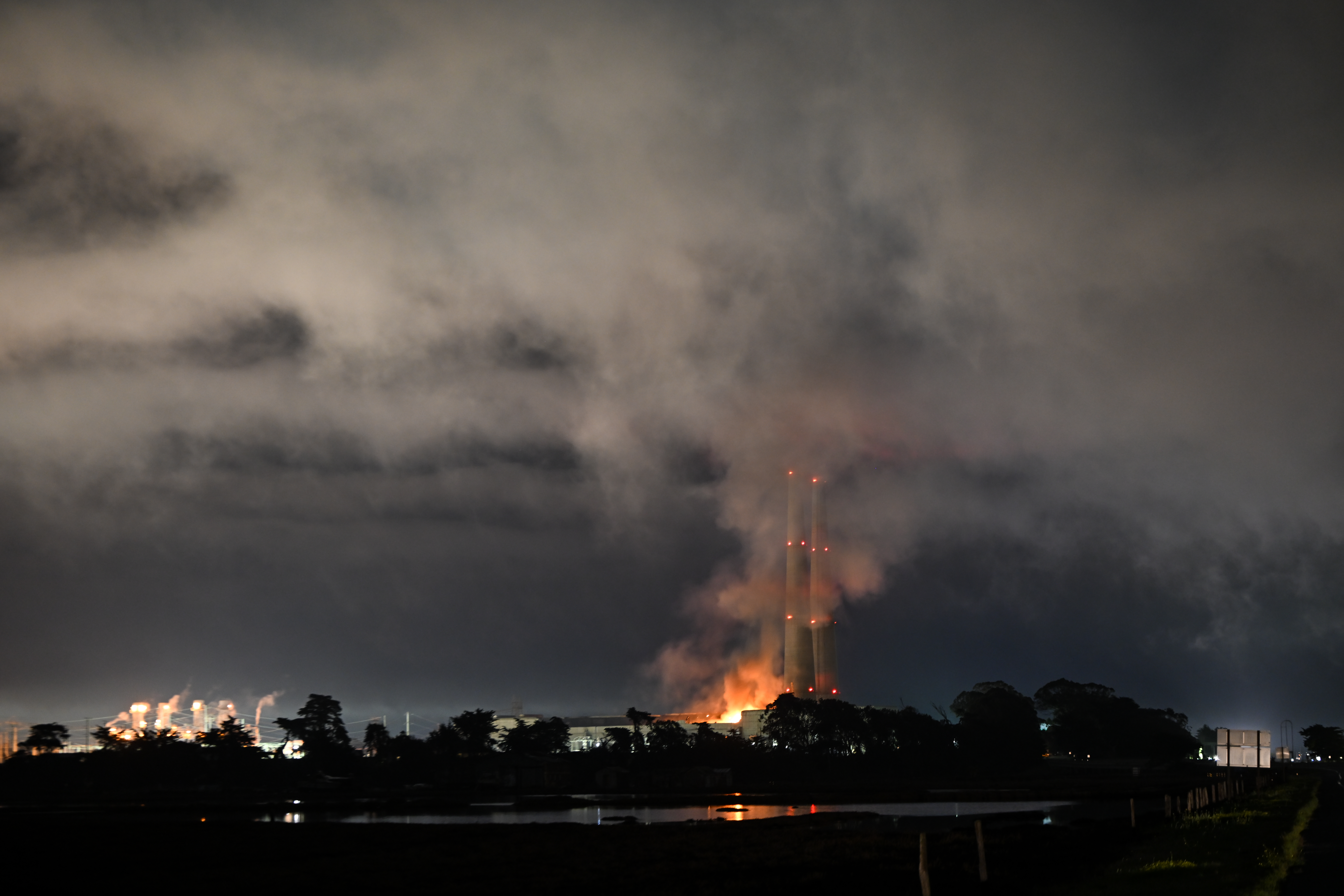 A view of flames and giant smoke over the sky as a fire erupted at Moss Landing Power Plant on Thursday that located on Pacific Coast Highway in Moss Landing of Monterey Bay, California, United States on January 17, 2025.