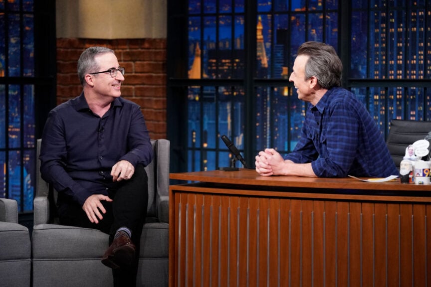 LATE NIGHT WITH SETH MEYERS -- Episode 1405 -- Pictured: (l-r) Comedian John Oliver during an interview with host Seth Meyers on March 13, 2023 -- (Photo by: Lloyd Bishop/NBC via Getty Images)