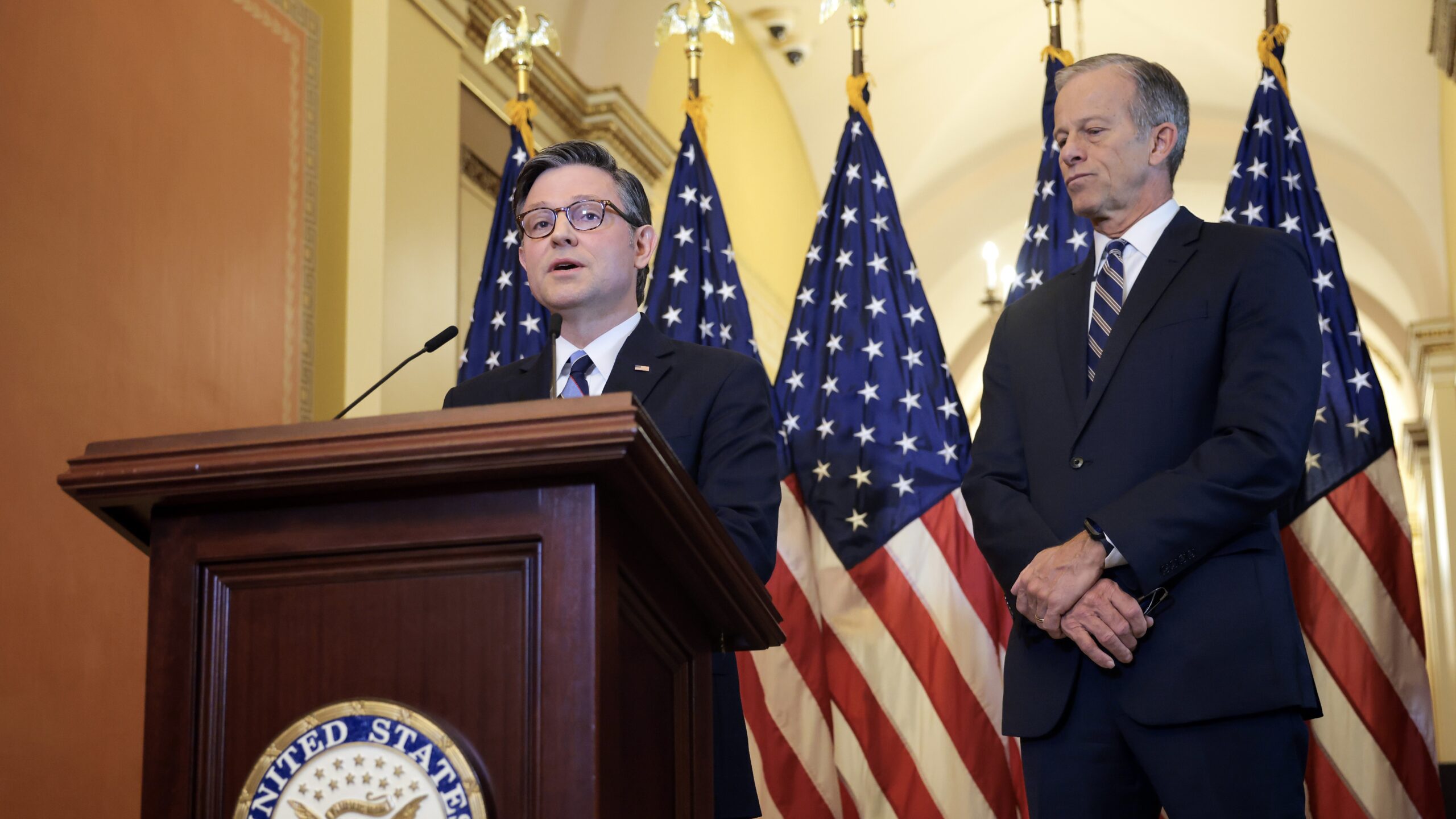 U.S. Speaker of the House Mike Johnson (R-LA) (L) and Senate Majority Leader John Thune (R-SD) speak at a press conference on the Republican budget bill at the U.S. Capitol on April 10, 2025 in Washington, DC.