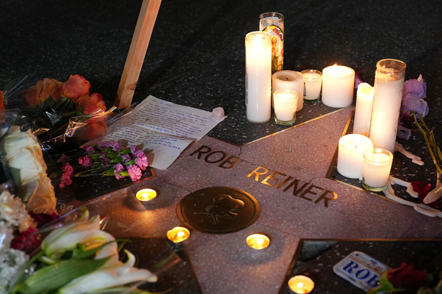 LOS ANGELES, CALIFORNIA - DECEMBER 15: Flowers and candles are placed on director/actor Rob Reiner's Star on the Hollywood Walk of Fame on December 15, 2025 in Los Angeles, California. The LAPD confirmed that Rob Reiner and his wife Michele Singer Reiner were found dead in their Brentwood home on December 14. Their son Nick has been arrested in connection to their deaths. (Photo by Matei Horvath/Getty Images)